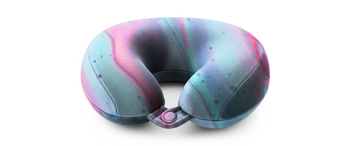 A soft travel neck pillow mockup with colorful nebula patterns freebie